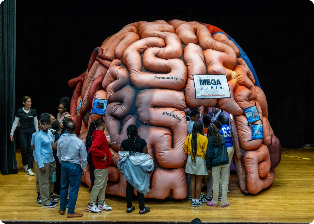 Our giant, inflatable brain makes an appearance at a school health education event.